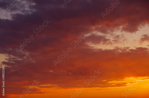 Fiery, orange and red colors sunset sky as background