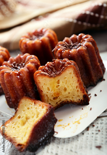 Photography Caneles de bordeaux - traditional French sweet dessert