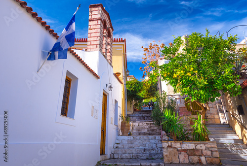 Fototapeta Street of Anafiotika in the old town of Athens, Greece. Anafiotika is district built by workers from the island Anafi. Popular tourist attraction.
