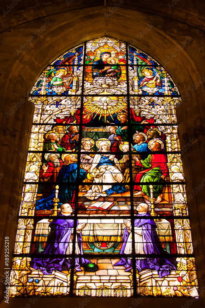 Seville, Andalusia, Spain - Detail of a stained glass window inside the Cathedral of Seville