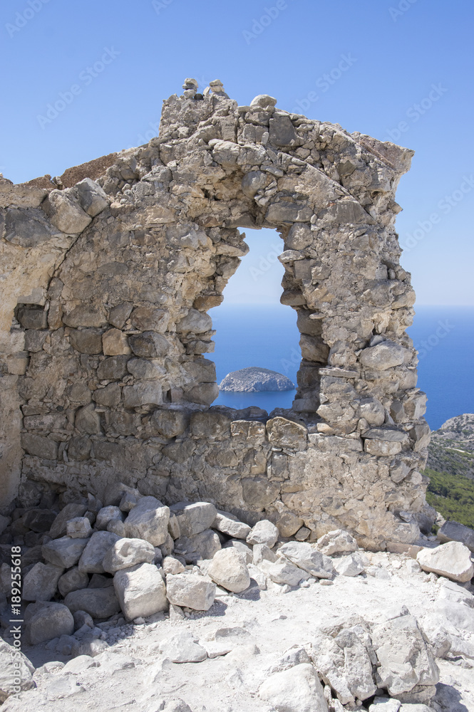 The castle of Monolithos, ruins medieval castle on the top of the rock, Rhodes, Greece