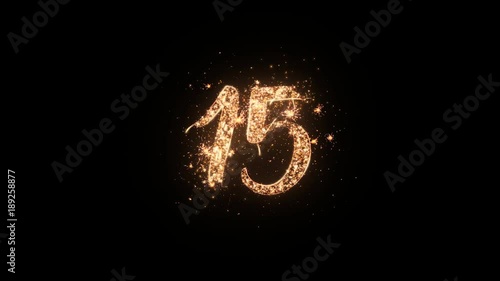 Letter 15 greeting text with particles and sparks isolated on black background, beautiful typography magic design. photo