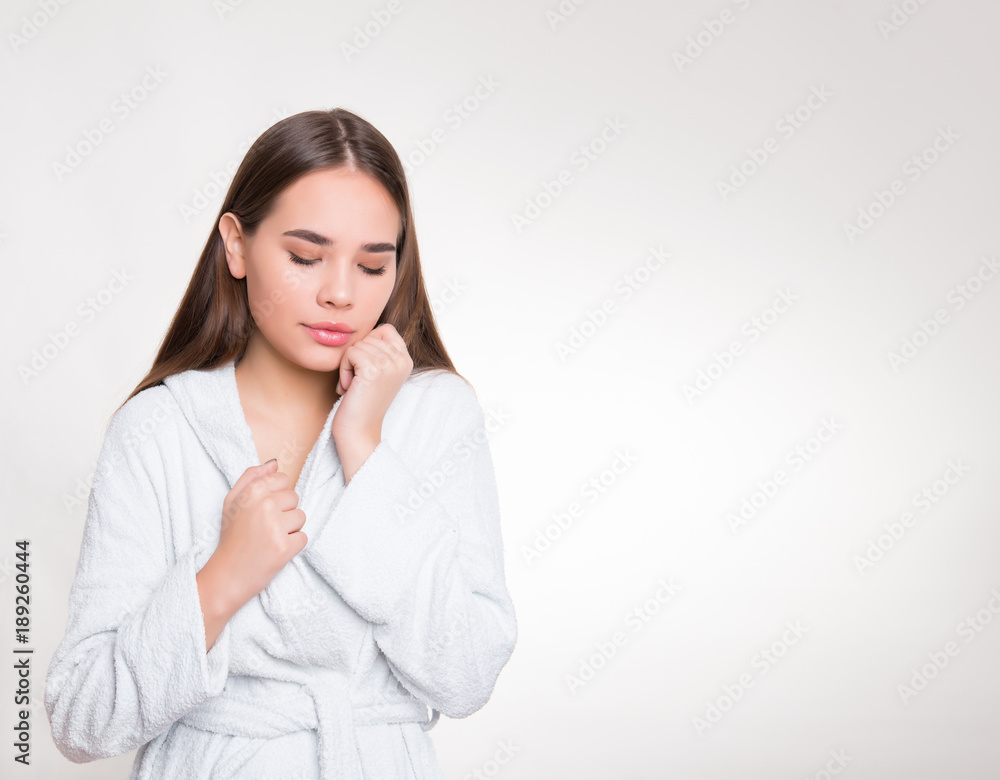 beautiful young woman with long hair wearing bath robe beautiful young woman with long hair wearing bath robe