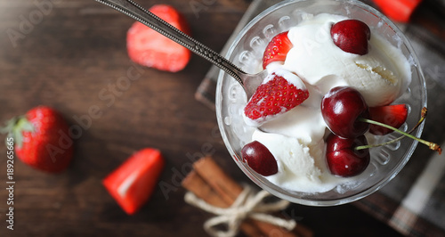 Fresh yogurt with berries. Ice cream in a bowl with fresh and ju