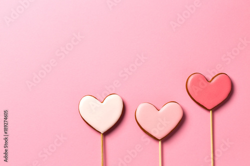 Gingerbread hearts isolated on pink background