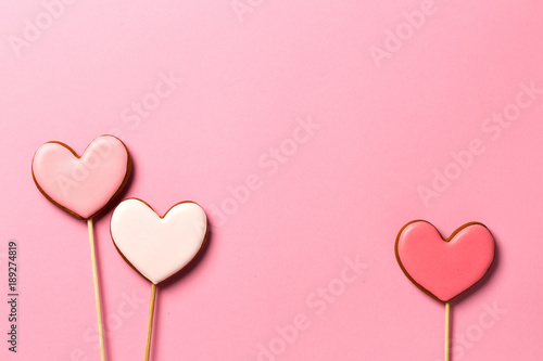 Gingerbread hearts isolated on pink background
