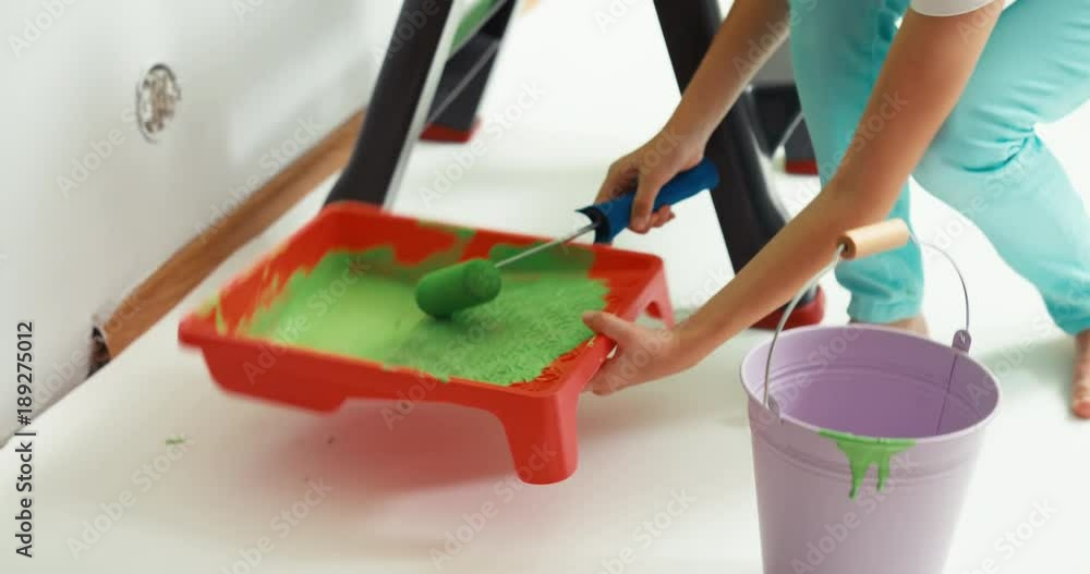 Child painting walls