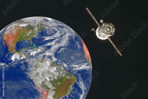 Satellite orbiting the earth in space.. Elements of this image furnished by NASA photo