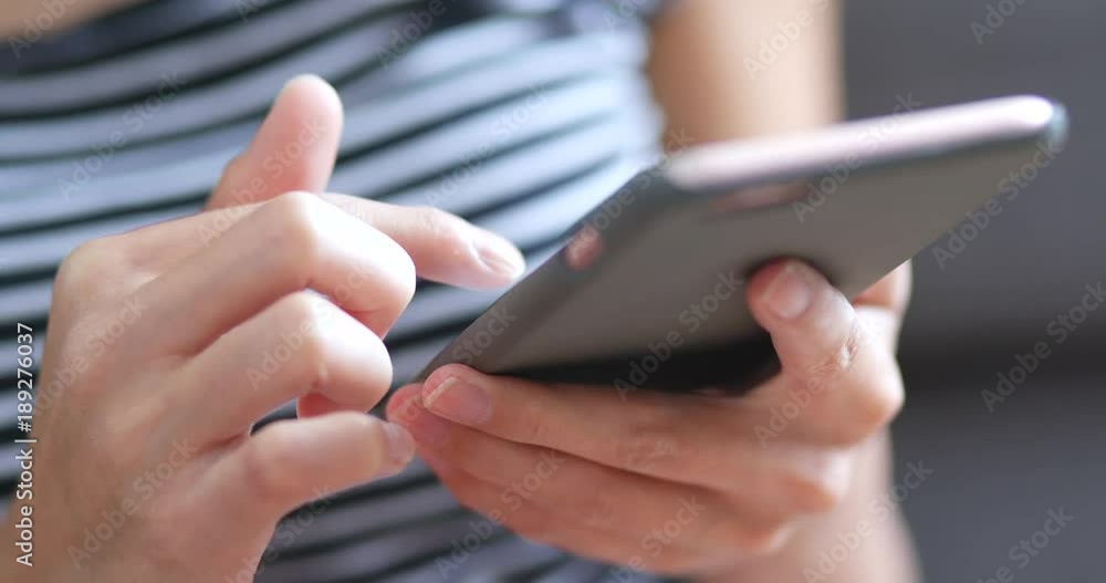 Close up of woman using mobile phone Close up of woman using mobile phone