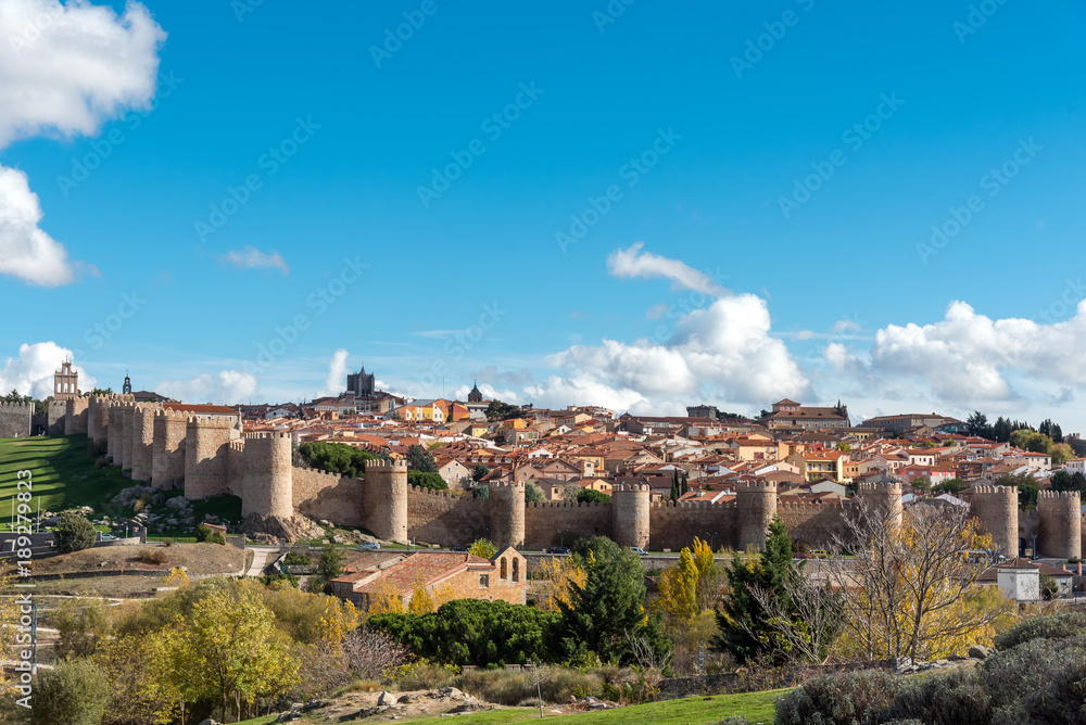 View of Avila in Spain with the famous surrounding city wall View of Avila in Spain with the famous surrounding city wall