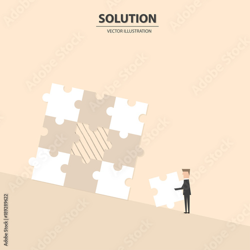 Businessman fulfill the puzzle by pieces together in a logical way, in order to arrive at the correct solution. Business concept of success, solution, management and decision.