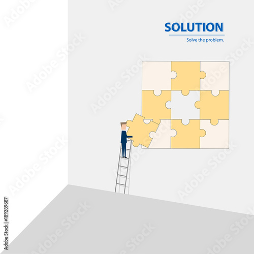 Businessman fulfill the puzzle by pieces together in a logical way, in order to arrive at the correct solution. Business concept of success, solution, management and decision.