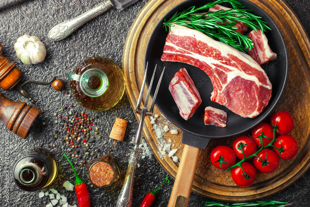 Raw meat on the old background Raw meat on the old background