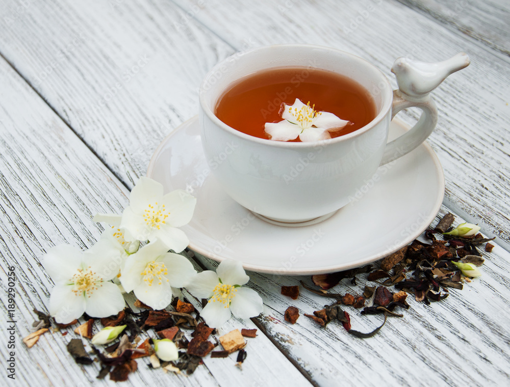 Cup of tea with jasmine flowers Cup of tea with jasmine flowers