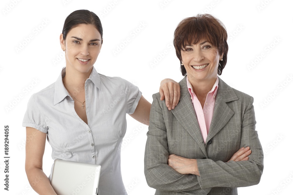 Portrait of mother and adult daughter