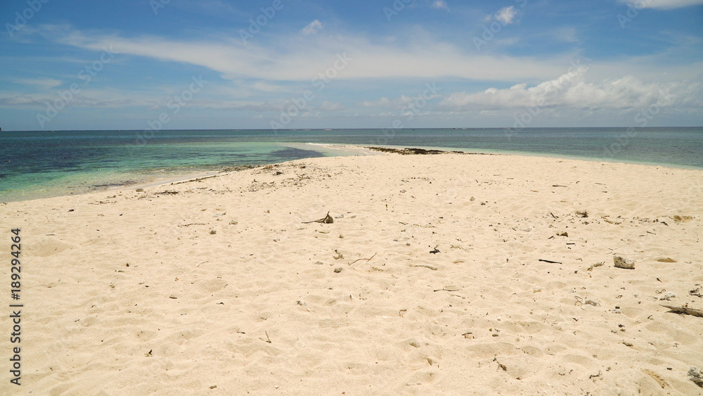Beach with white sand on a tropical island. Seascape ocean and beautiful beach paradise, Siargao, Philippines. Tropical landscape. Travel concept. Beach with white sand on a tropical island. Seascape ocean and beautiful beach paradise, Siargao, Philippines. Tropical landscape. Travel concept.