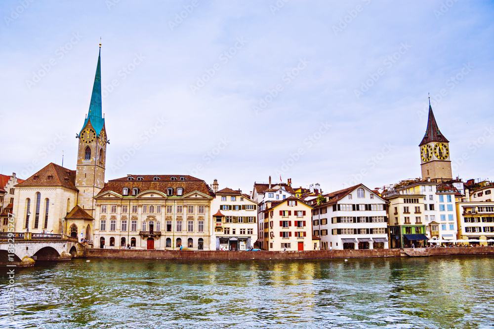 View of the historic city center of Zurich with famous Fraumunster Church and munsterbrucke with river Limmat, Canton of Zurich, Switzerland