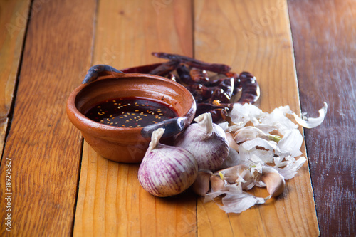 Fototapeta kuchenna Mexican sauce with oil and dry pepper