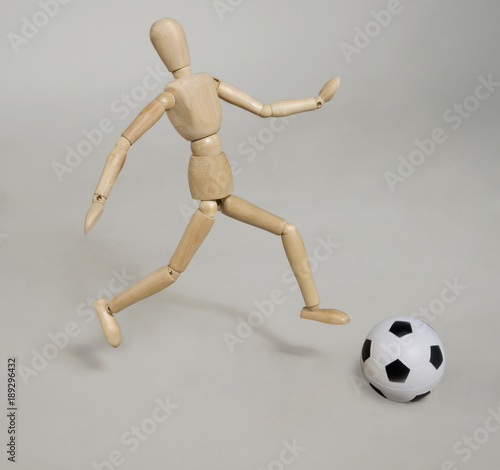 a puppet with a soccer ball