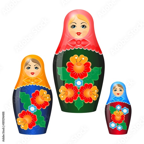 Wooden nesting dolls in shawls and ethnic floristic patterns
