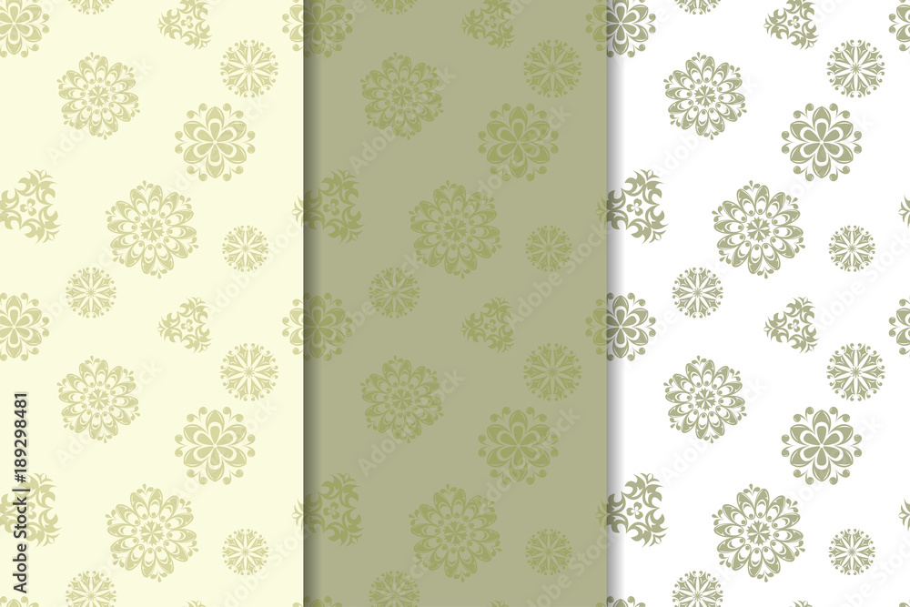 Olive green set of floral ornaments. Seamless patterns Olive green set of floral ornaments. Seamless patterns