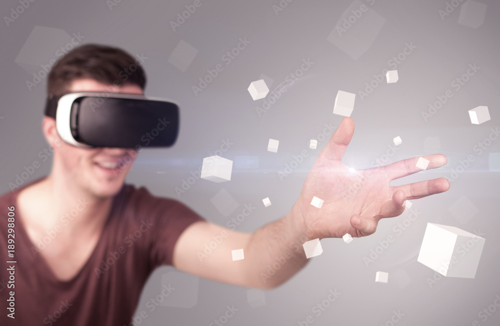 Man wearing virtual reality goggles Man wearing virtual reality goggles
