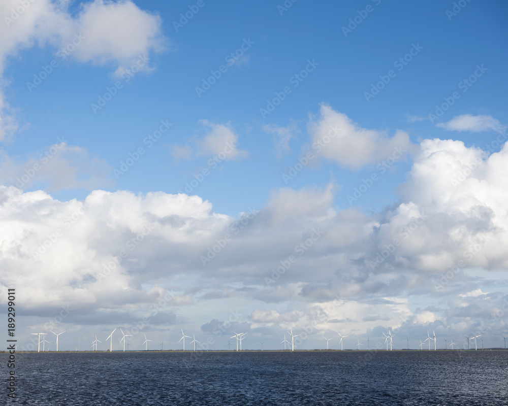 lot of wind turbines on dutch island of flevoland seen from eempolder in noord-holland