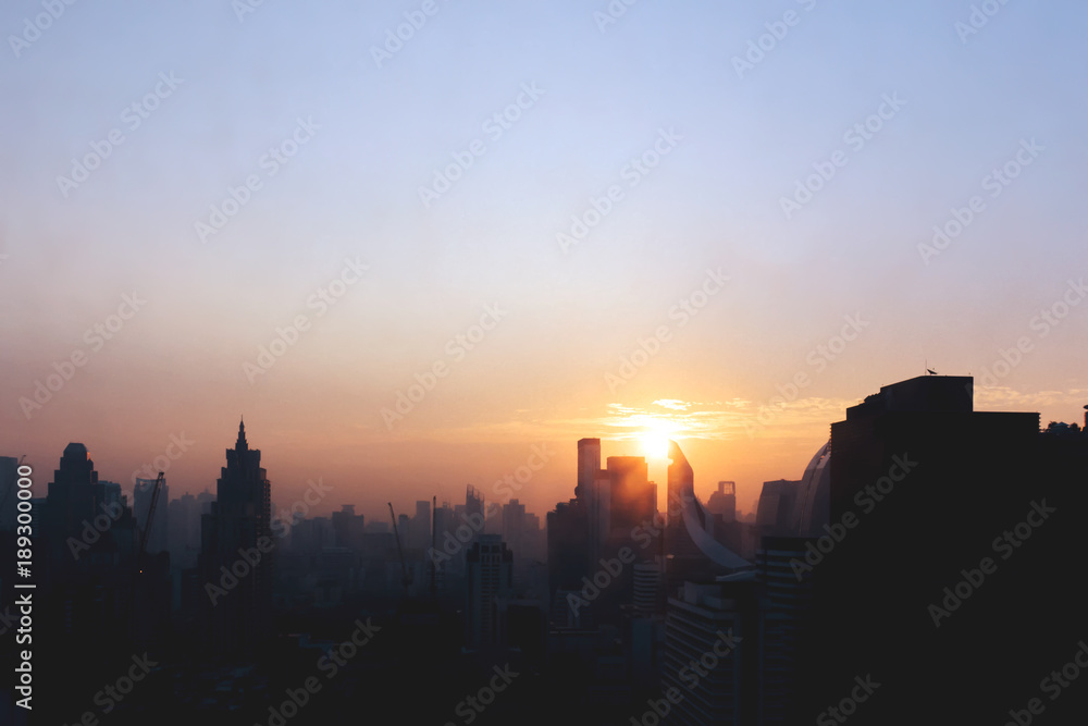 silhouette of beautiful city with soft-focus and over light in the background