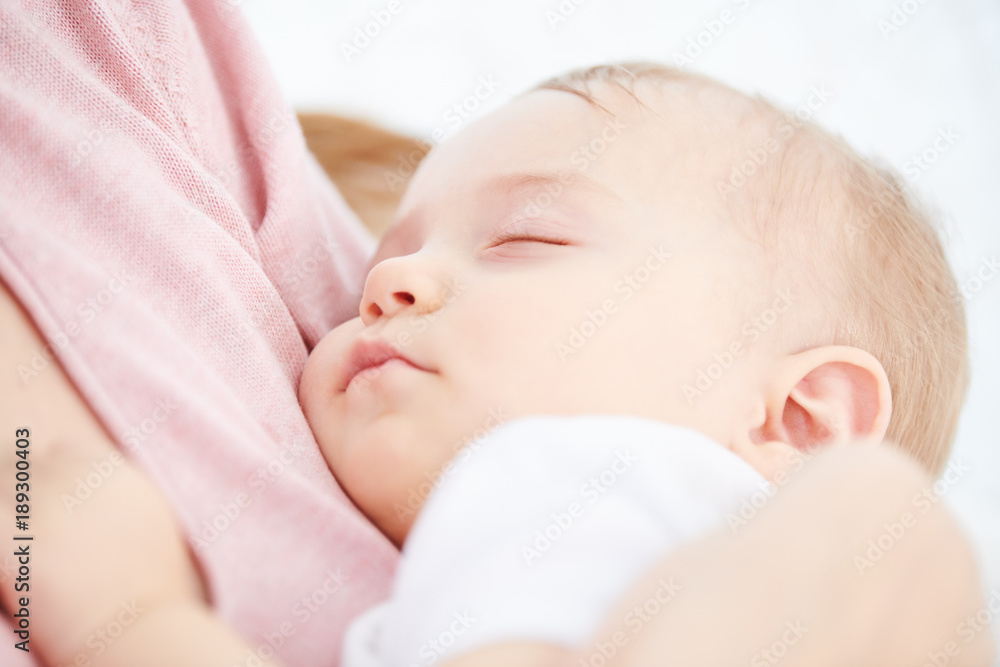 Childhood. little baby sleeping. Breast feeding Childhood. little baby sleeping. Breast feeding