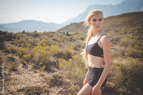 Wallpaper Mural Female model practicing yoga in the outdoors doing stretching and exercising balance. Torontodigital.ca