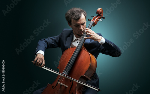 Cellist playing on instrument with empathy