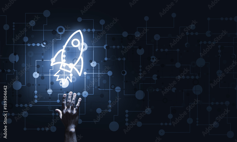 Technology idea concept with glowing rocket icon and touching it finger