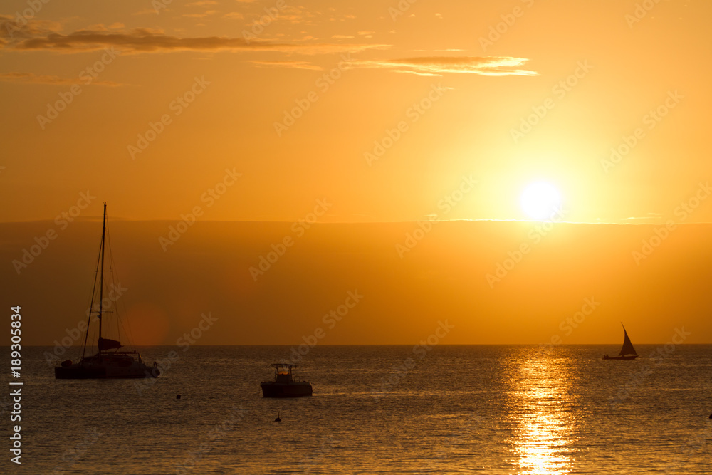 the beautiful beach and sea of zanzibar during the sunset in the indian ocean