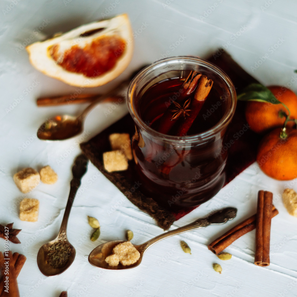 Cup of herbal tea on dark aged rustic background, top view, place for text, border Cup of herbal tea on dark aged rustic background, top view, place for text, border
