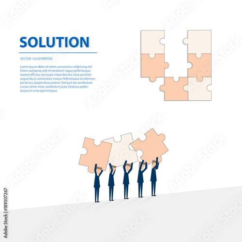 Businessmen helping together to fulfill the puzzle by pieces together in a logical way, in order to arrive at the correct solution.