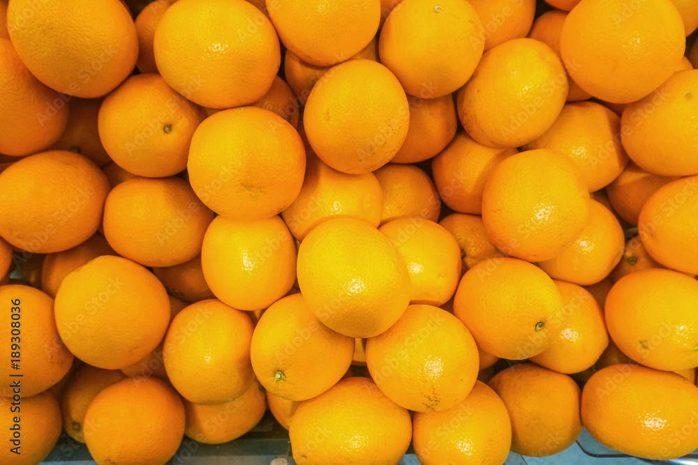 Pile of Fresh Navel Oranges are selling in supermarket Pile of Fresh Navel Oranges are selling in supermarket
