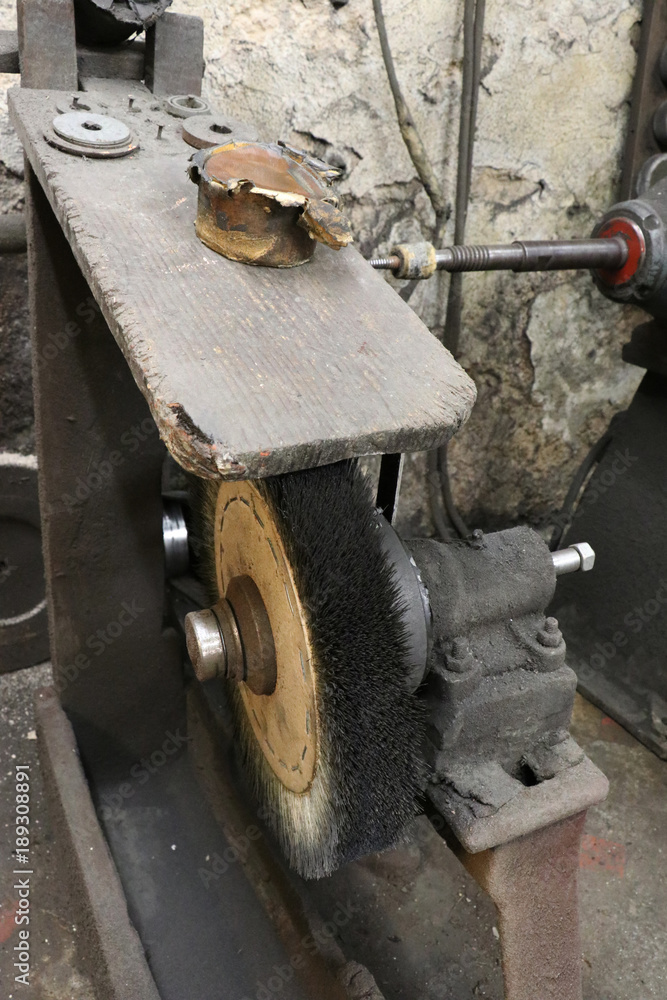 An old traditional brush at a grindery