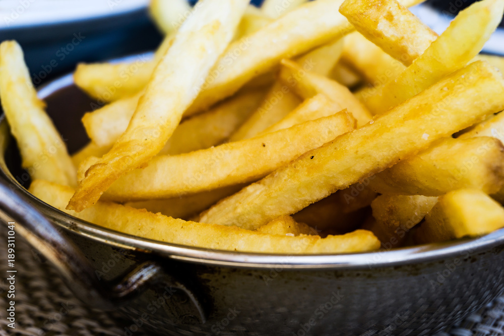 Golden French fries potatoes ready to be eaten Golden French fries potatoes ready to be eaten