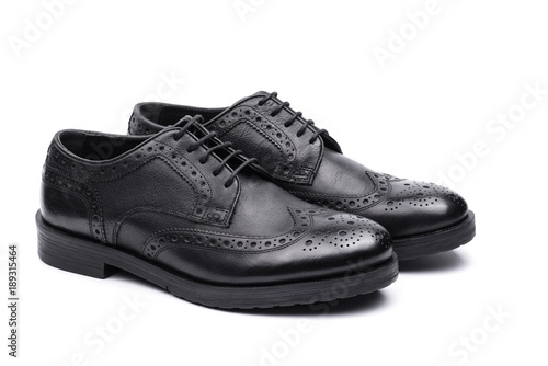 Black brogues. Isolated on a white background.