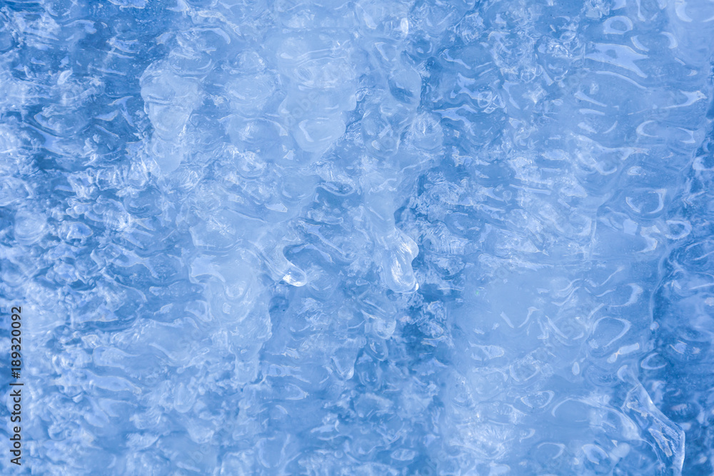 Background of Blue ice with a wavy structure Background of Blue ice with a wavy structure