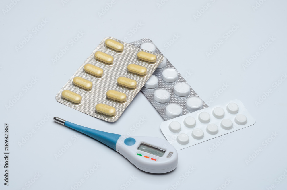 Medicines with a thermometer, tablets against viral diseases Medicines with a thermometer, tablets against viral diseases