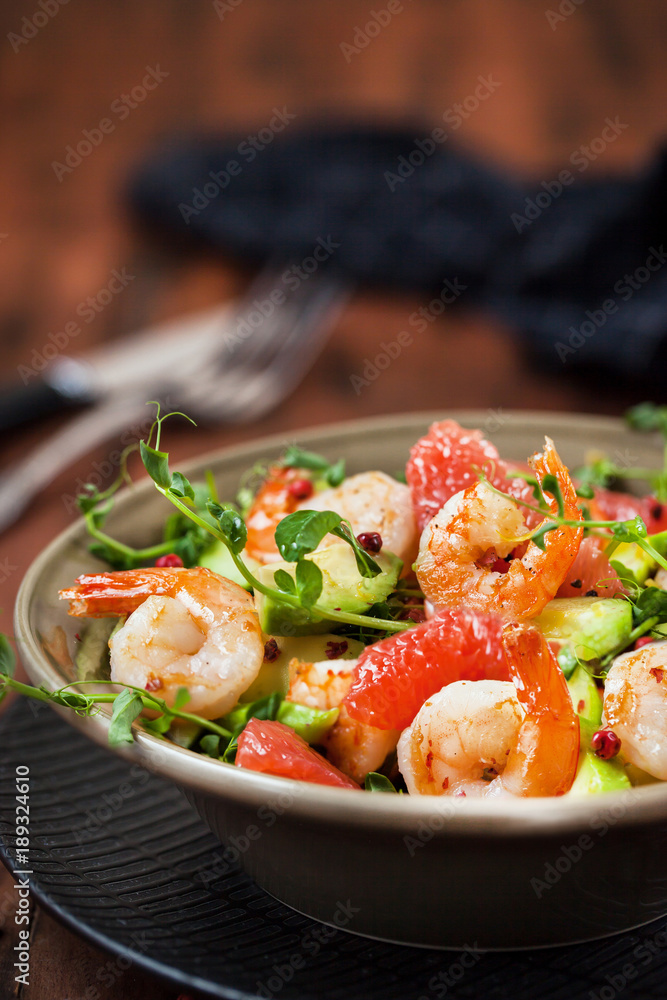 Delicious fresh salad with prawns, grapefruit, avocado, cucumber Delicious fresh salad with prawns, grapefruit, avocado, cucumber