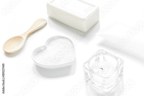 white set of cosmetics for spa on table background