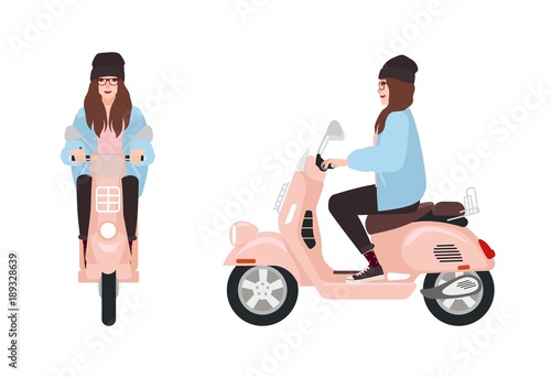Smiling hipster girl dressed in trendy casual clothes riding pink scooter