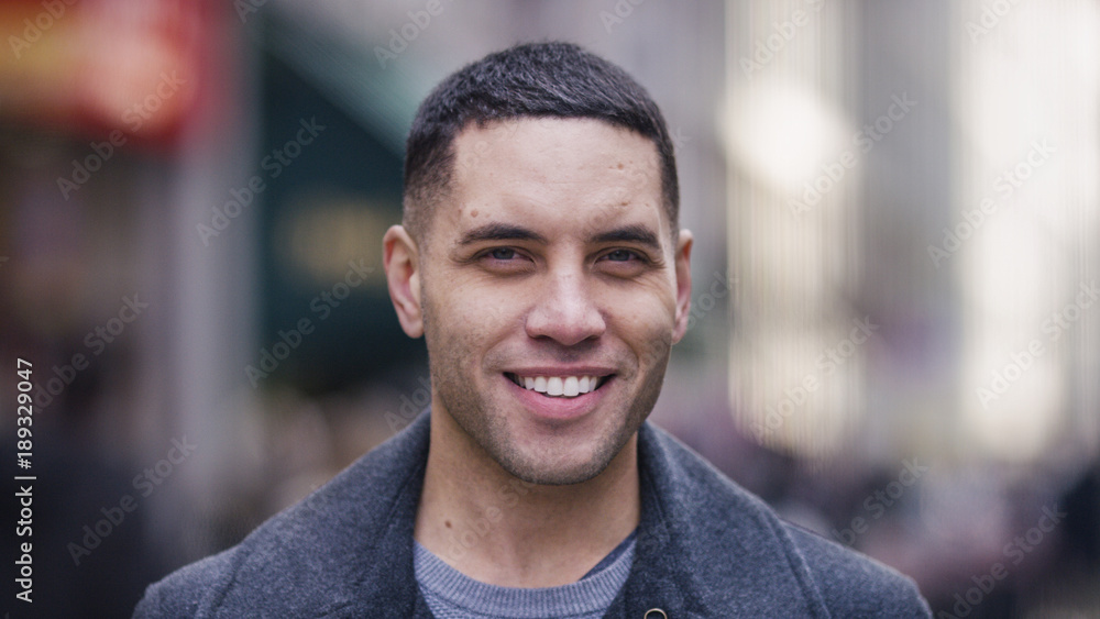 Portrait of attractive male man smiling to camera Portrait of attractive male man smiling to camera