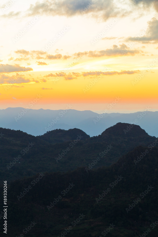 Fototapeta premium Majestic sunset coulourful sky mountain layer