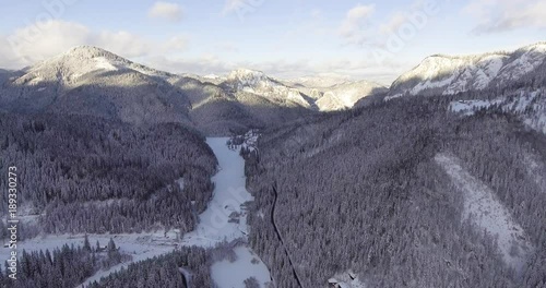 Mountain And Forest In Winter Near A House Aerial