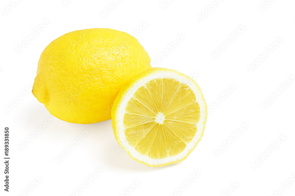 One whole and half of yellow ripe lemon fruit, isolated on a white background