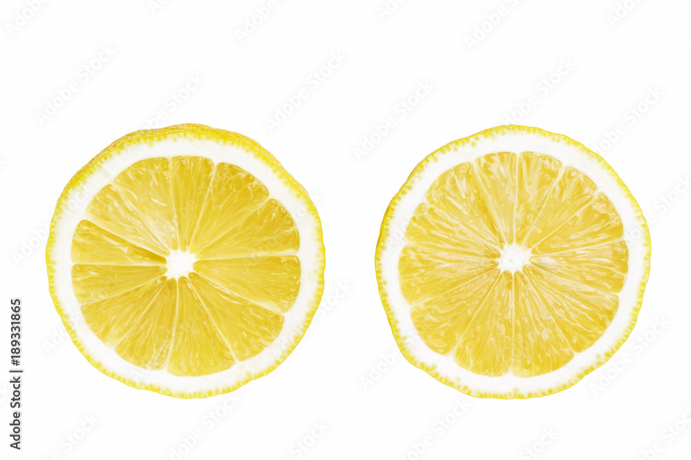 Two round slices of yellow ripe lemon fruit, isolated on a white background, top view