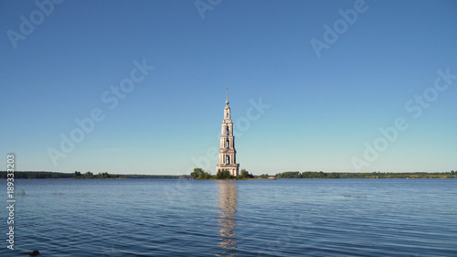 Ancient Christian church located on an island in the middle of the lake. Aerial view Old monastery.